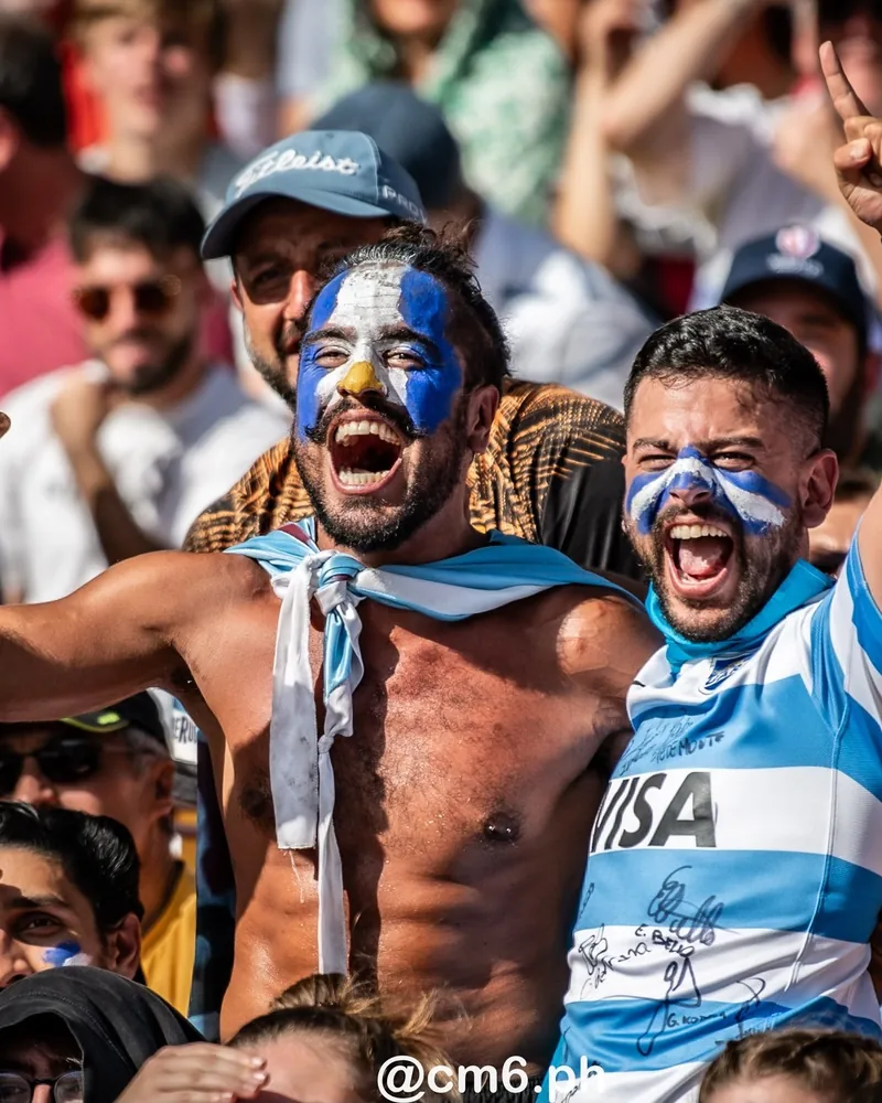 Aficionados en un evento deportivo internacional